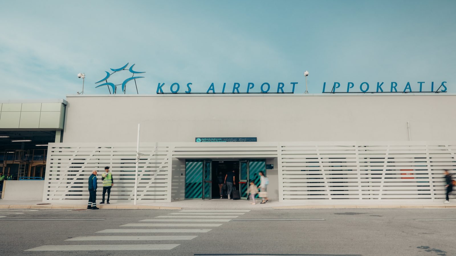 The terminal building at Kos International Airport Ippokratis on a clear summer day