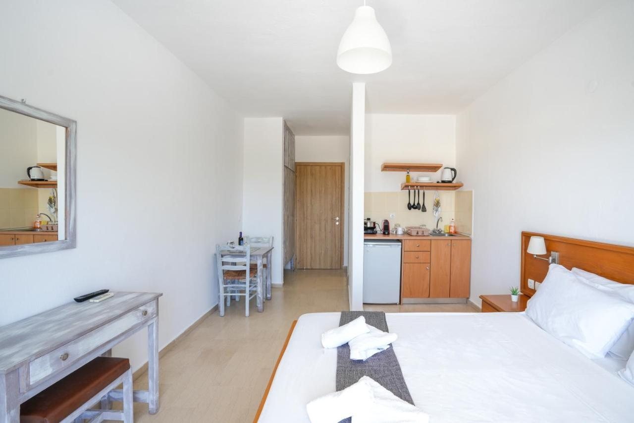 Garden studio interior with kitchenette and dining corner